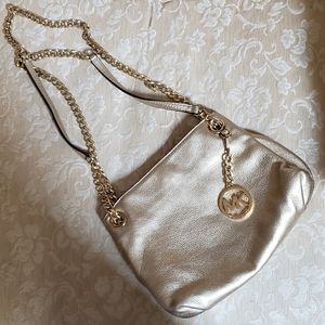 Micheal Kors leather gold metallic purse